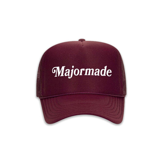Maroon trucker hat with 'Majormade' text on a white background